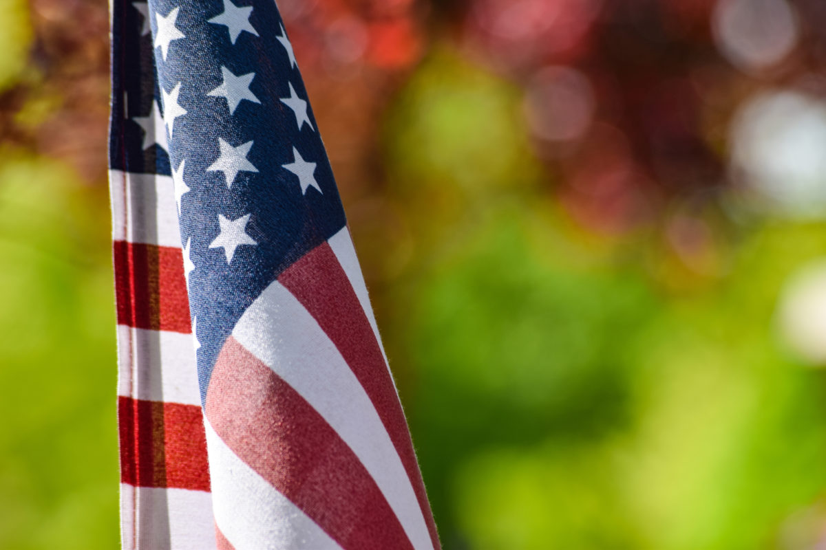 Close up detail photos of the stars and strips of the United States American flag, taken outside