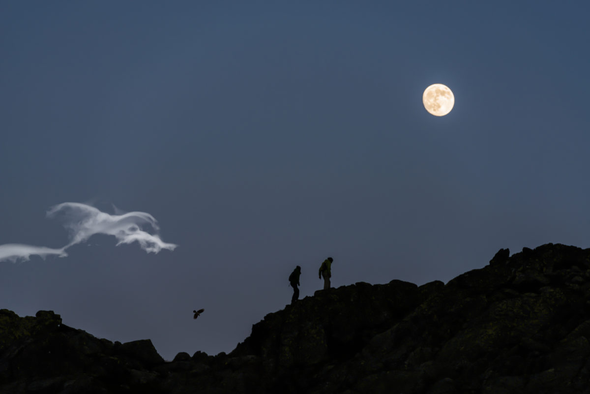 Trekking in the night in the moonlight