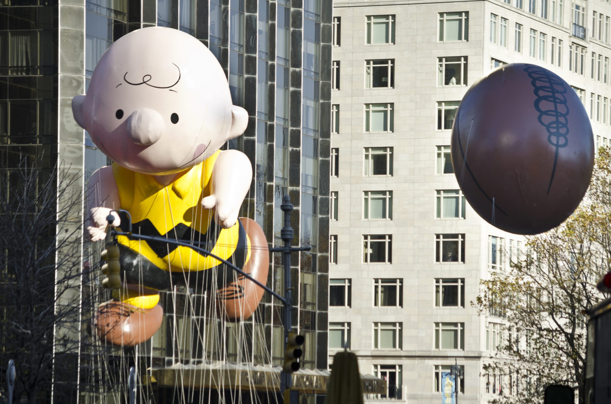 New York, USA - November 22, 2012: Charlie Brown balloon is flying on Central Park West at the 86th Annual Macy's Thanksgiving Day Parade.